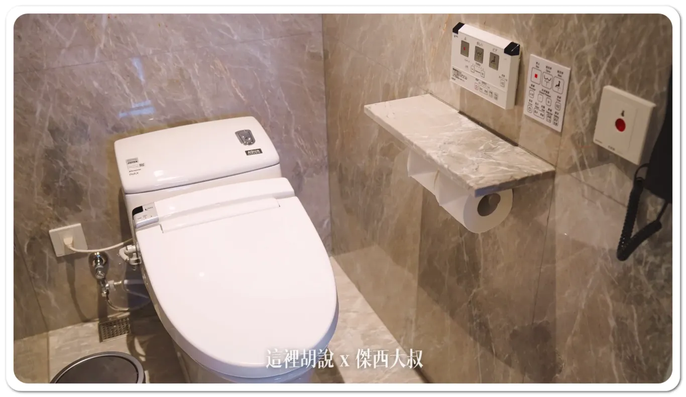 The toilet's an INAX brand.
