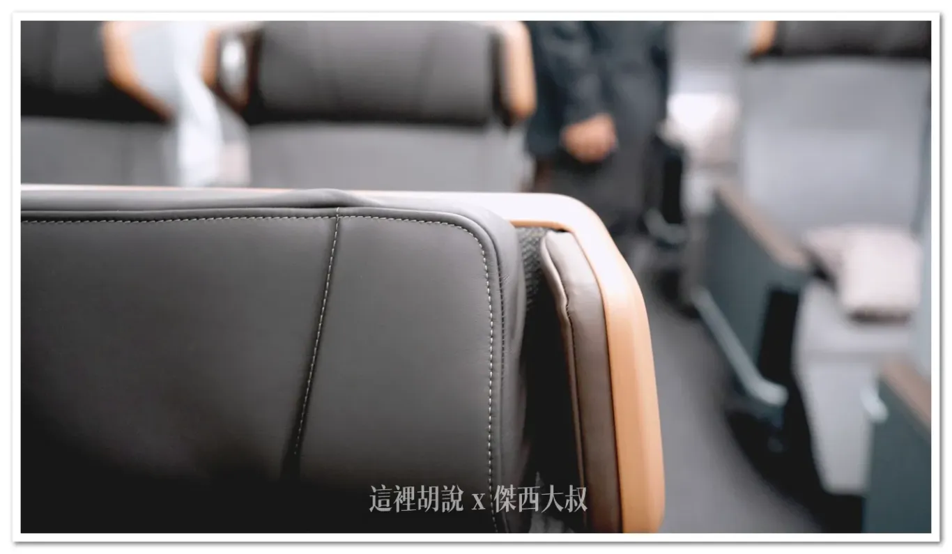 The headrest itself and its surrounding area are covered in leather.