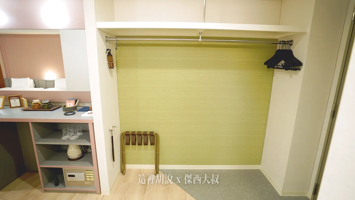 The entrance mudroom features a very large open coat rack, perfect for storing various clothing items The entrance mudroom features a very large open coat rack, perfect for storing various clothing items