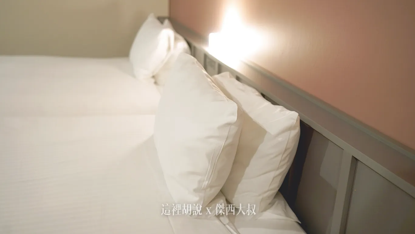 There is no bedside table, but there is a shallow shelf above for placing glasses, and a small light in the center There is no bedside table, but there is a shallow shelf above for placing glasses, and a small light in the center