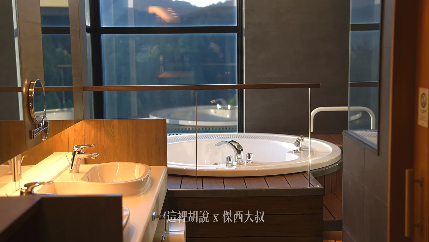 The vanity and bathtub have been renovated with sleeker, more minimalist lines.
