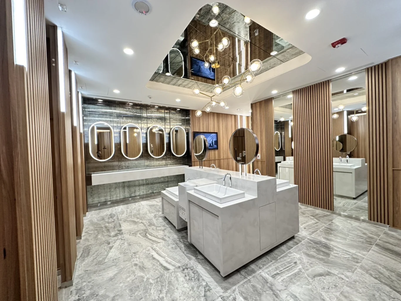 Beautifully Designed Women's Restroom: Includes lower sinks for children and a spacious, modern layout. (Photo credit: Tasa Meng)