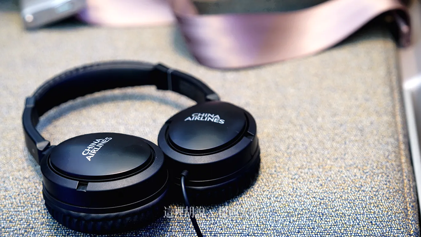 Active noise-canceling headphones are provided in Premium Economy. Active noise-canceling headphones are provided in Premium Economy.