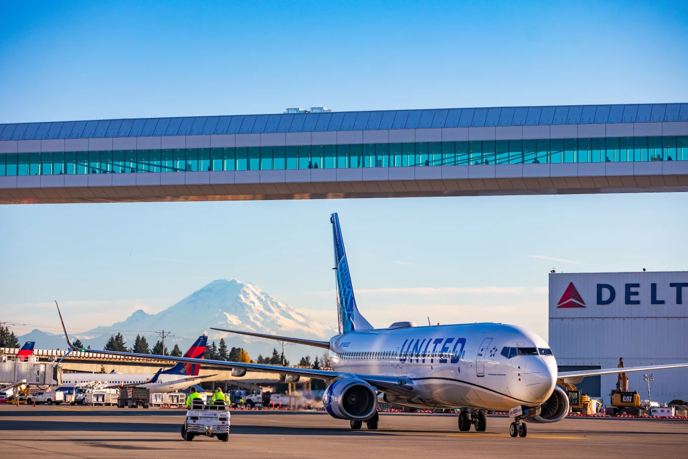 Ramp operations at SEA, with Washington state's iconic Mount Rainier framing the horizon.Photo / Port of Seattle