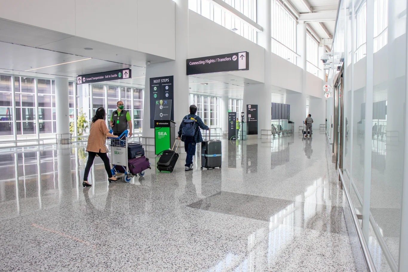 After clearing border control, the path forks: the left corridor leads directly down to Seattle Arrivals,while the right channel is designated for Connecting Flights. Photo / Port of Seattle